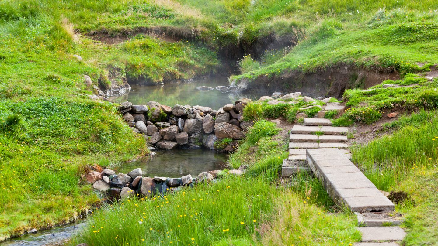 A steaming geothermal valley in the Icelandic countryside