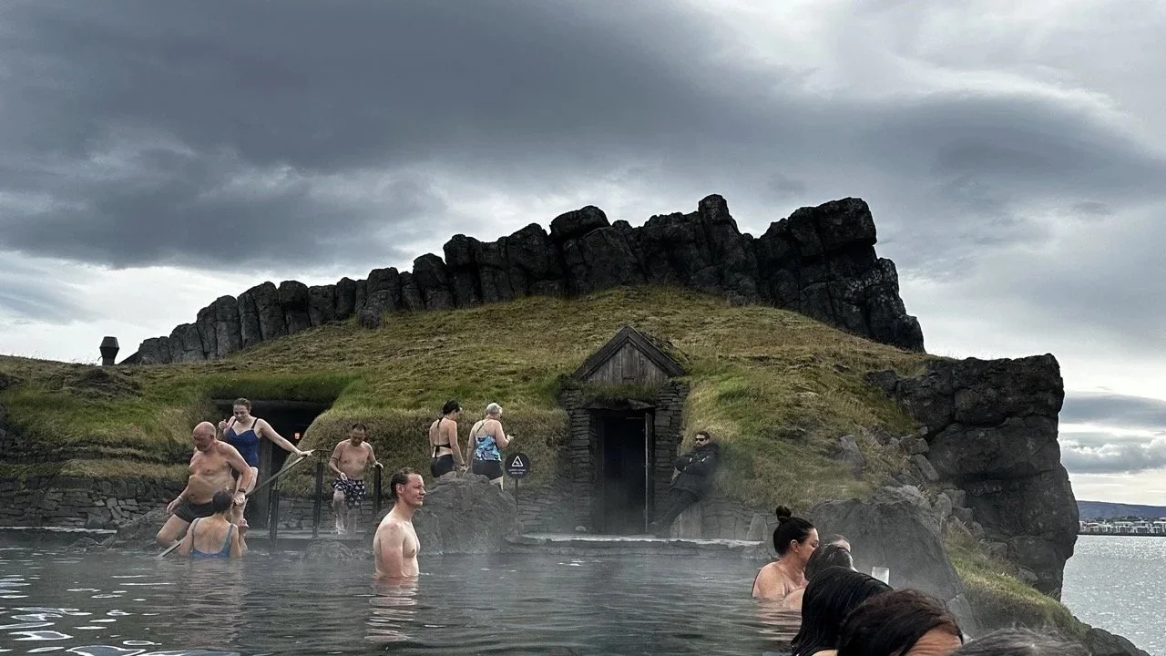 Bathing at a turf-roofed geothermal lagoon